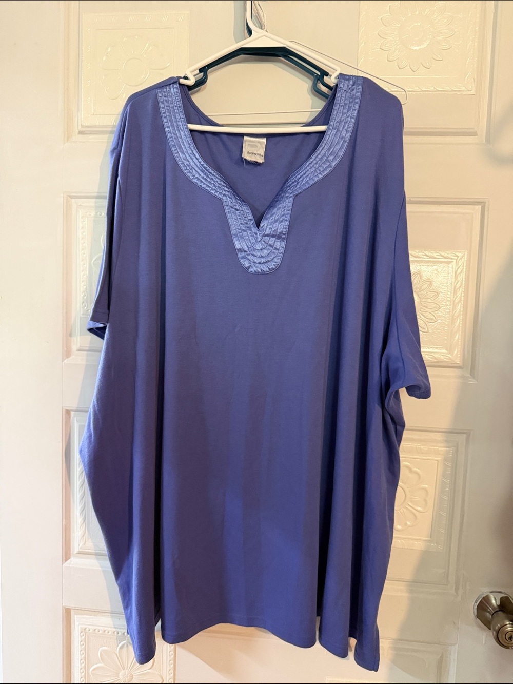 Short sleeve top by Roamans. Accented neckline.